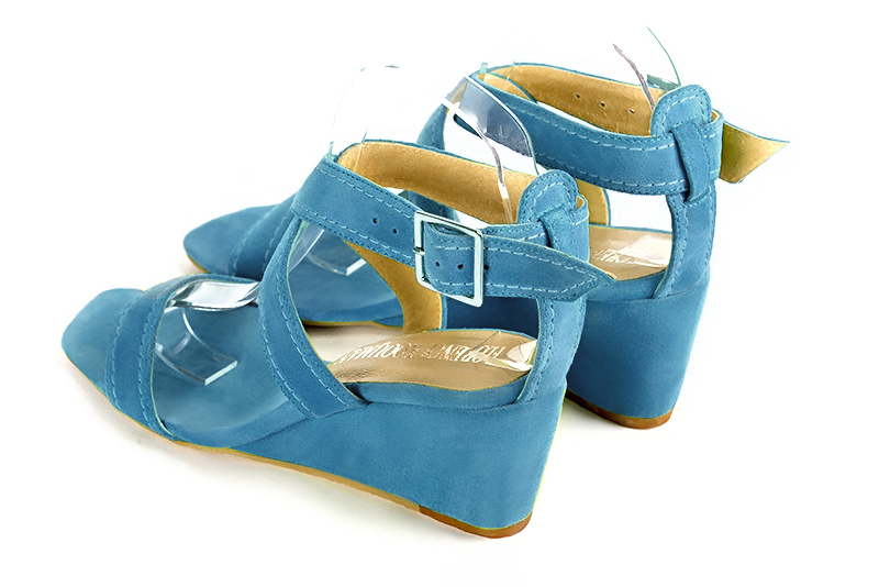Peacock blue women's fully open sandals, with crossed straps. Square toe. Medium wedge heels. Rear view - Florence KOOIJMAN